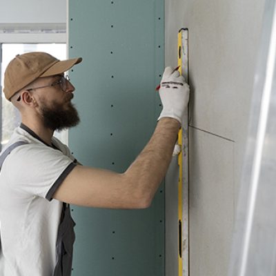 tiler-working-renovation-apartment-a tiler-working-renovation-apartment-a